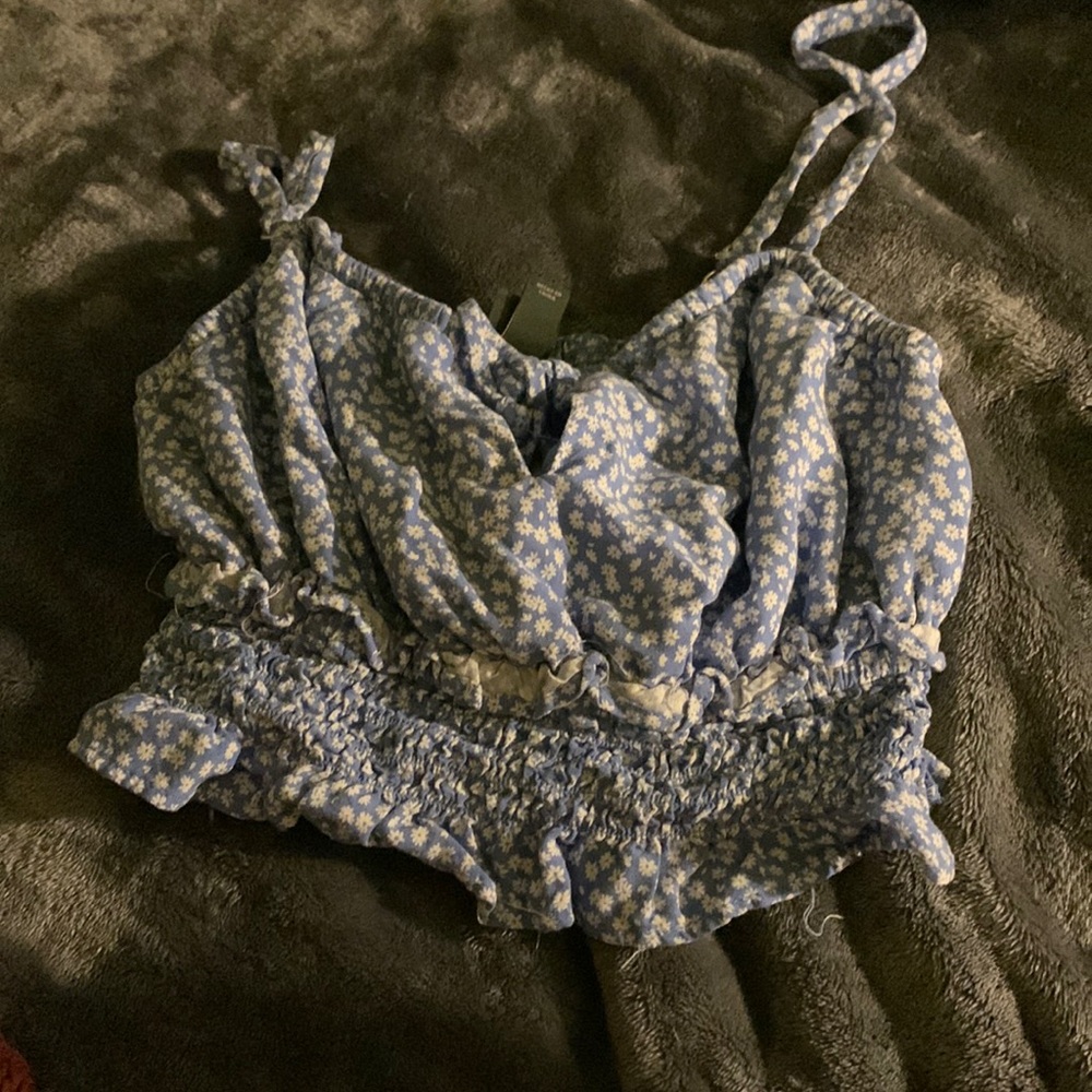 blue with white flower blouse/tank crop would recommend hand washing m